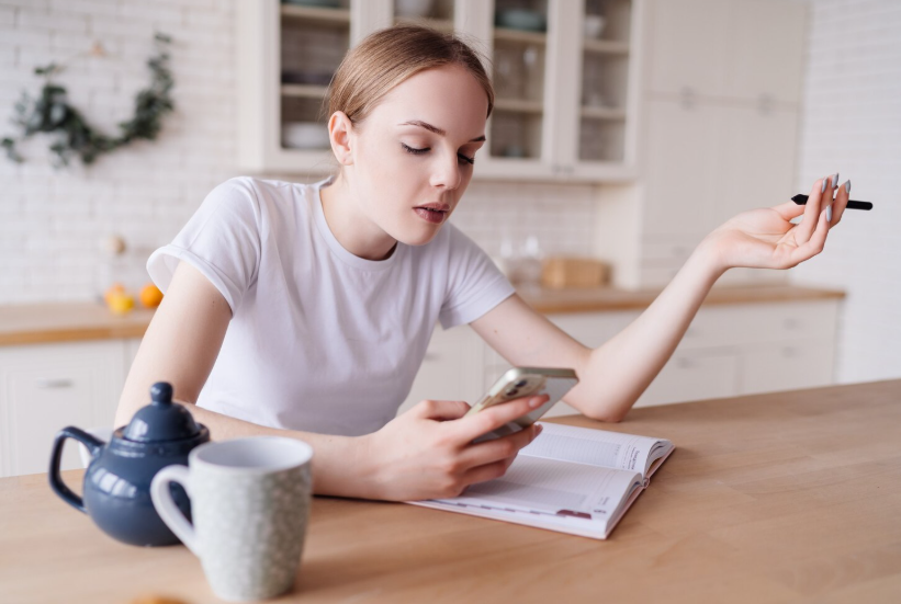 Woman at desk, illustrating is it worth it searches during decision fatigue.